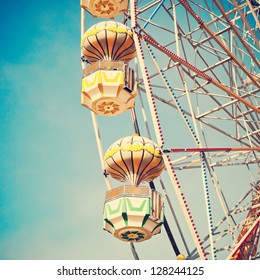 Vintage Retro Ferris Wheel On Blue Sky