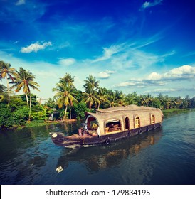 Vintage Retro Hipster Style Travel Image Of Kerala Travel Tourism Background - Houseboat On Kerala Backwaters. Kerala, India