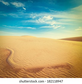 Vintage retro hipster style travel image of white sand dunes on sunrise, Mui Ne, Vietnam - Shutterstock ID 182118947