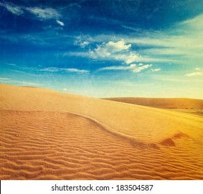 Vintage retro hipster style travel image of  white sand dunes on sunrise, Mui Ne, Vietnam with grunge texture overlaid - Shutterstock ID 183504587