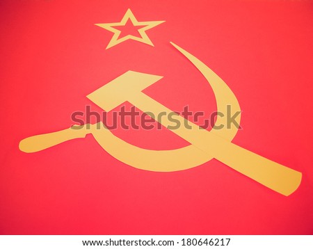 Vintage retro looking Communist CCCP Flag with hammer and sickle, symbols of communism, yellow over red