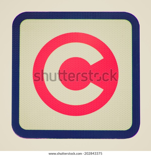 Vintage retro looking A picture of London congestion\
charge sign