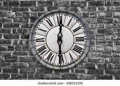 Vintage Retro Style Clock On A Brick Wal, Black And White