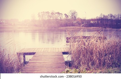 Vintage Retro Toned Image Of Lake In Autumn.