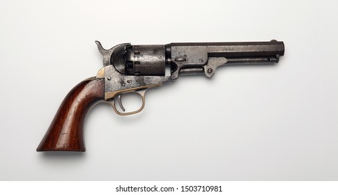 Vintage Revolver Hand Gun With Short Barrel On White Background With Barrel Pointing Right