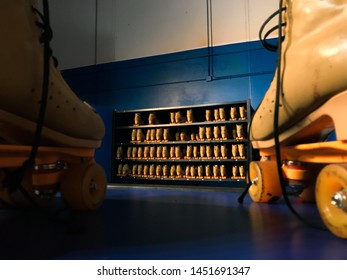 Vintage Roller Skates At Rink Close Up.