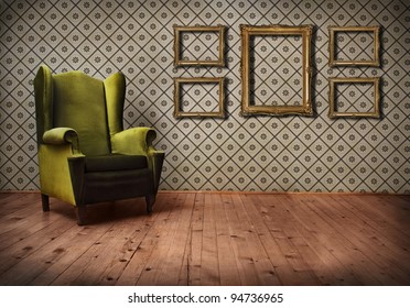 Vintage Room Interior With Wallpaper, Retro Golden Picture Frames And Old Fashioned Armchair. 