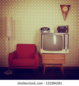 Vintage room with wallpaper, old fashioned armchair, retro tv, phone, clocks, radio player and standart lamp