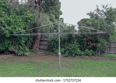 Vintage Rotary Clothes Line In Australian Backyard