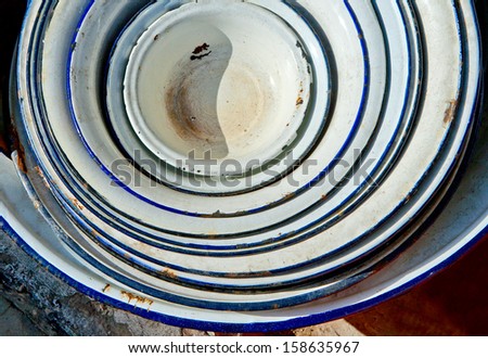 Similar – empty old soup plate with spoon on old wooden background