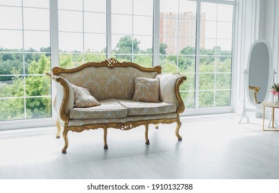 Vintage Royal Sofa In A Room Near Big Window. Classic Interior