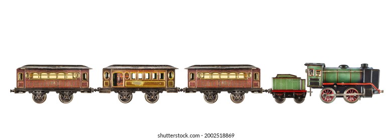 Vintage rusted and weathered toy passenger train with locomotive isolated on a white background - Powered by Shutterstock