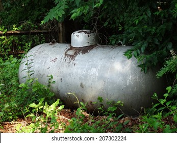 Vintage Rusting Silver-colored Large Residential Liquid Propane Tank 