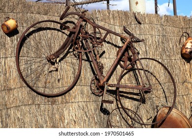 Vintage Rusty Bike Hanging On Wall