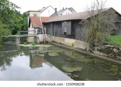 Vintage Saw Mill With Reflection In River