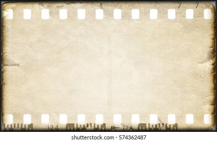 Vintage Sepia Film Strip Frame On Old And Damaged Paper.