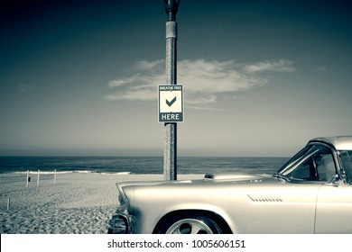 Vintage Shiny Silver Car With Background Of Beach