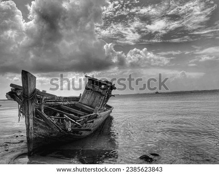 Vintage shipwreck near beach photo
