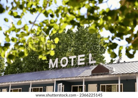 Vintage sign on an old fashioned motel in the mountains