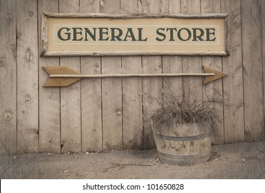 A Vintage Sign Pointing To A General Store. Wild West Theme .