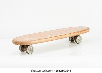 Vintage skateboard on white background