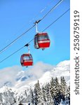 Vintage Ski gondola over the slopes of Courchevel ski resort, French alps