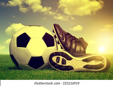 Vintage Soccer Background With Ball And Cleats