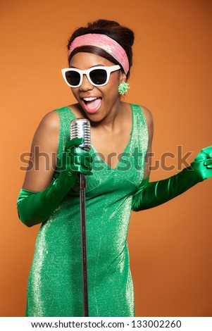 Vintage soul funk woman singing. Black african american.