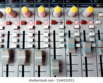 Vintage Sound Or Audio Mixer In A Recording Studio. Knobs, Dials And Sliders On A Soundboard