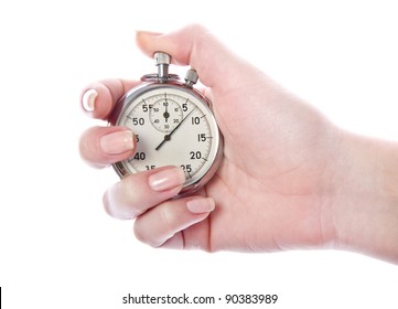 Vintage Sport Timer Stop Watch In A Woman's Hand. Isolated On White