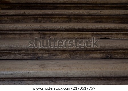 Vintage stairs, selective focus on the wooden steps. Old wooden stairs.