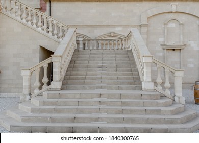 Vintage stairs from white marble in an old antique building