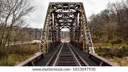 vintage steel railroad bridge in the country