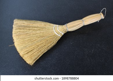 A Vintage Straw Whisk Broom