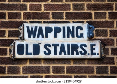 Vintage street sign for Wapping Old Stairs in London, UK.