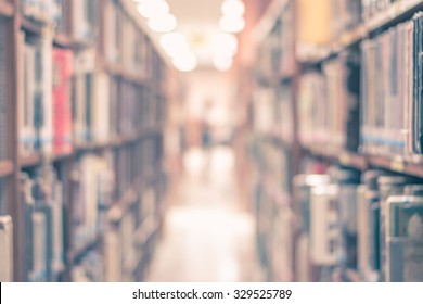 Vintage style blur school library with book shelves  for education background
