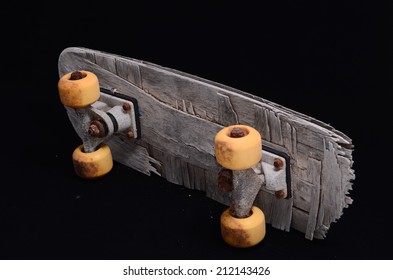 Vintage Style Concued Skateboard On A Black Background