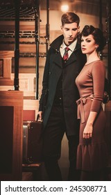 Vintage Style Couple Inside Retro Train Coach 