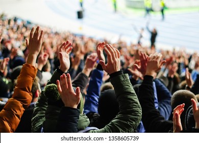 Vintage Style Photo Of A Crowd, Happy People Enjoying Rock Concert, Raised Up Hands And Clapping Of Pleasure, Active Night Life Concept