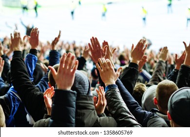 Vintage Style Photo Of A Crowd, Happy People Enjoying Rock Concert, Raised Up Hands And Clapping Of Pleasure, Active Night Life Concept