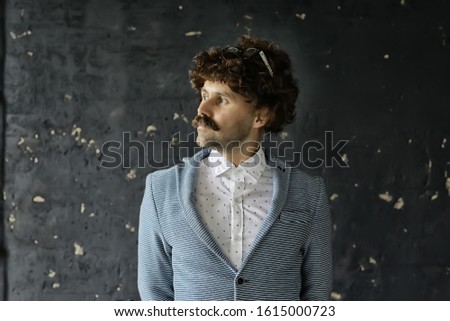 vintage style, portrait of a man with a large mustache, unusual gentleman