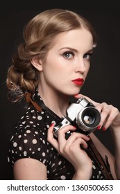 Vintage Style Portrait Of Young Beautiful Girl With Photo Camera
