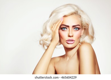 Vintage Style Portrait Of Young Beautiful Tanned Sensual Platinum Blonde Girl With Stylish Make-up And Hairdo