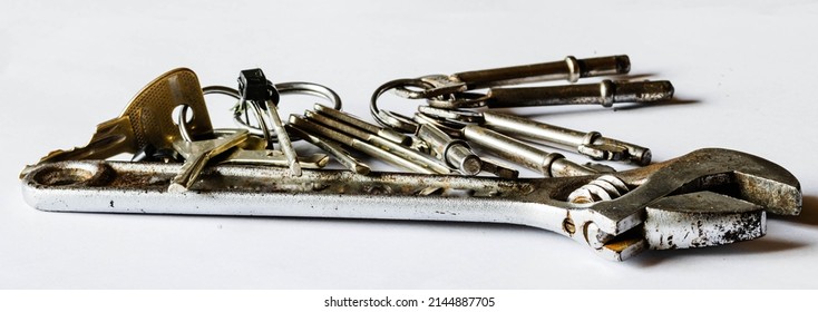 vintage style skeleton keys, old monkey wrench and bolt nut