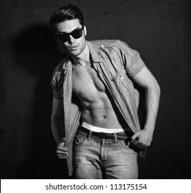 Vintage Stylized Black And White Photo Of Young Male Model (Photo Has An Intentional Film Grain)