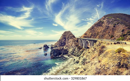 Vintage stylized California coastline along Pacific Coast Highway, USA.