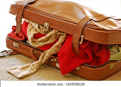 overstuffed suitcase