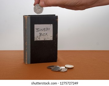 Vintage Swear Box, With UK Coins, Money And Hand.