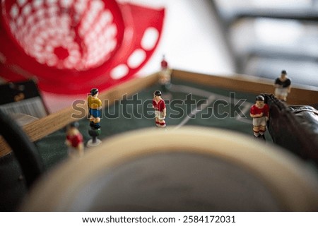 Similar – Image, Stock Photo Metal old foosball table with yellow and blue figurines