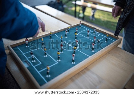 Similar – Image, Stock Photo Metal old foosball table with yellow and blue figurines